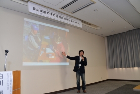 北広島町高原の自然館　主任学芸員　白河勝信氏。北広島長では、中学生・小学生が授業の一環で茅刈りを実施し、地域通貨との連携を実現させているそうです。